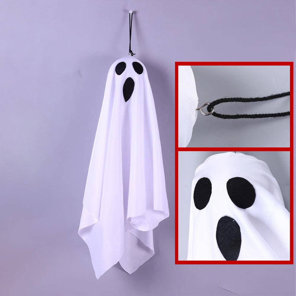 Halloween hanging ghost decoration at night